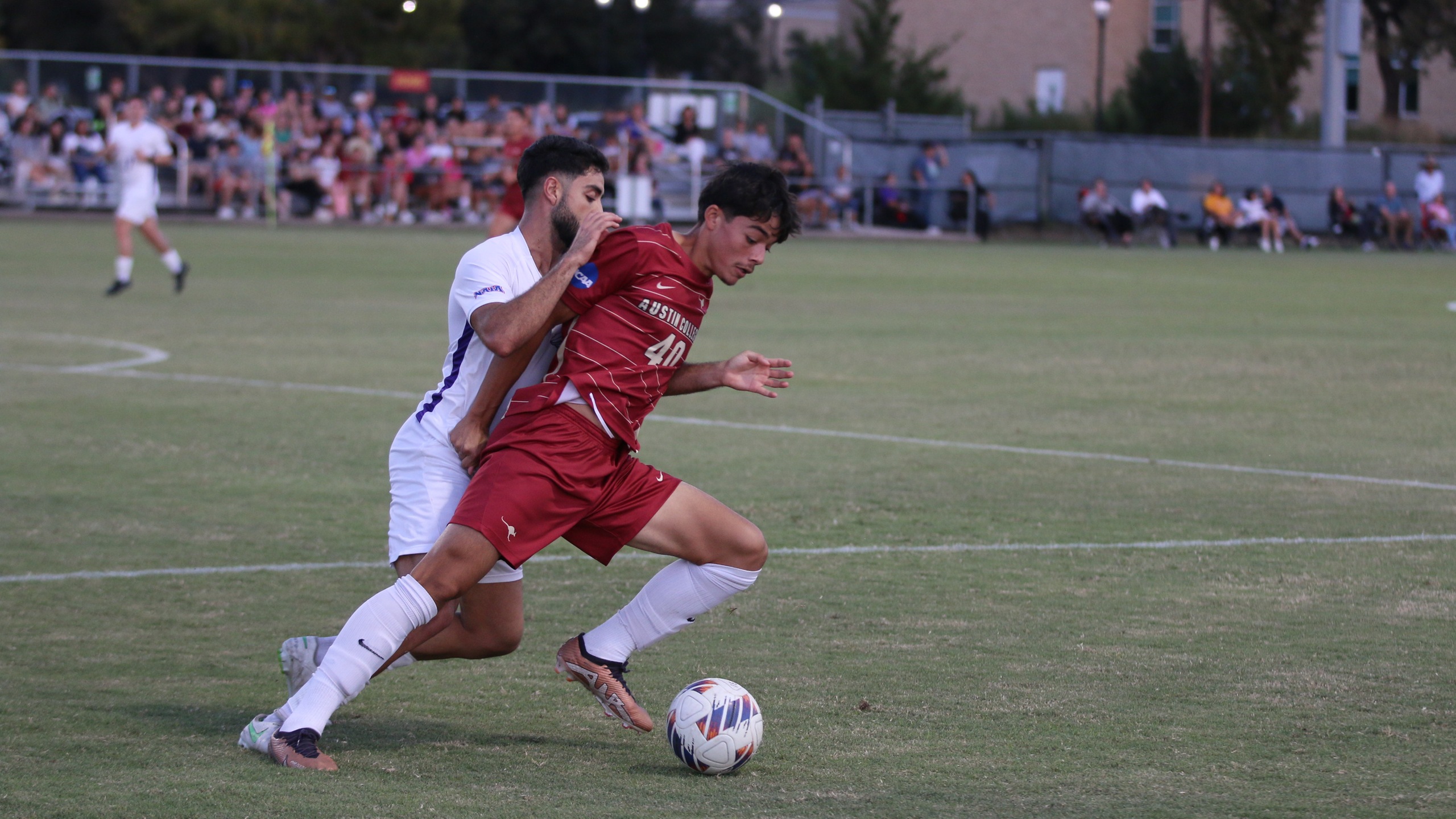 AC men's soccer roman quintana in action